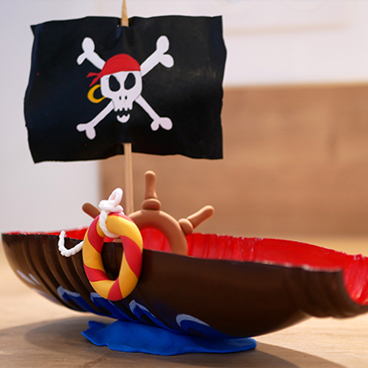 Create an awesome pirate ship with airdrying clay and a milk bottle!